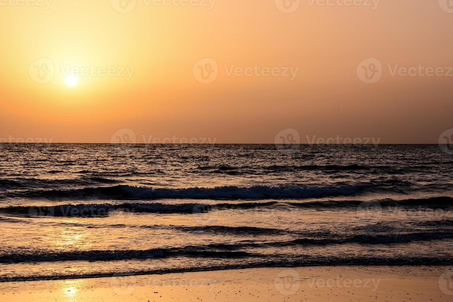 Sunset over the sea photo