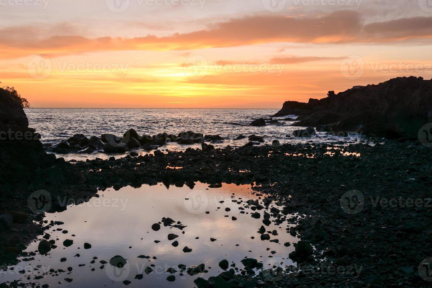 Sunset over the sea photo