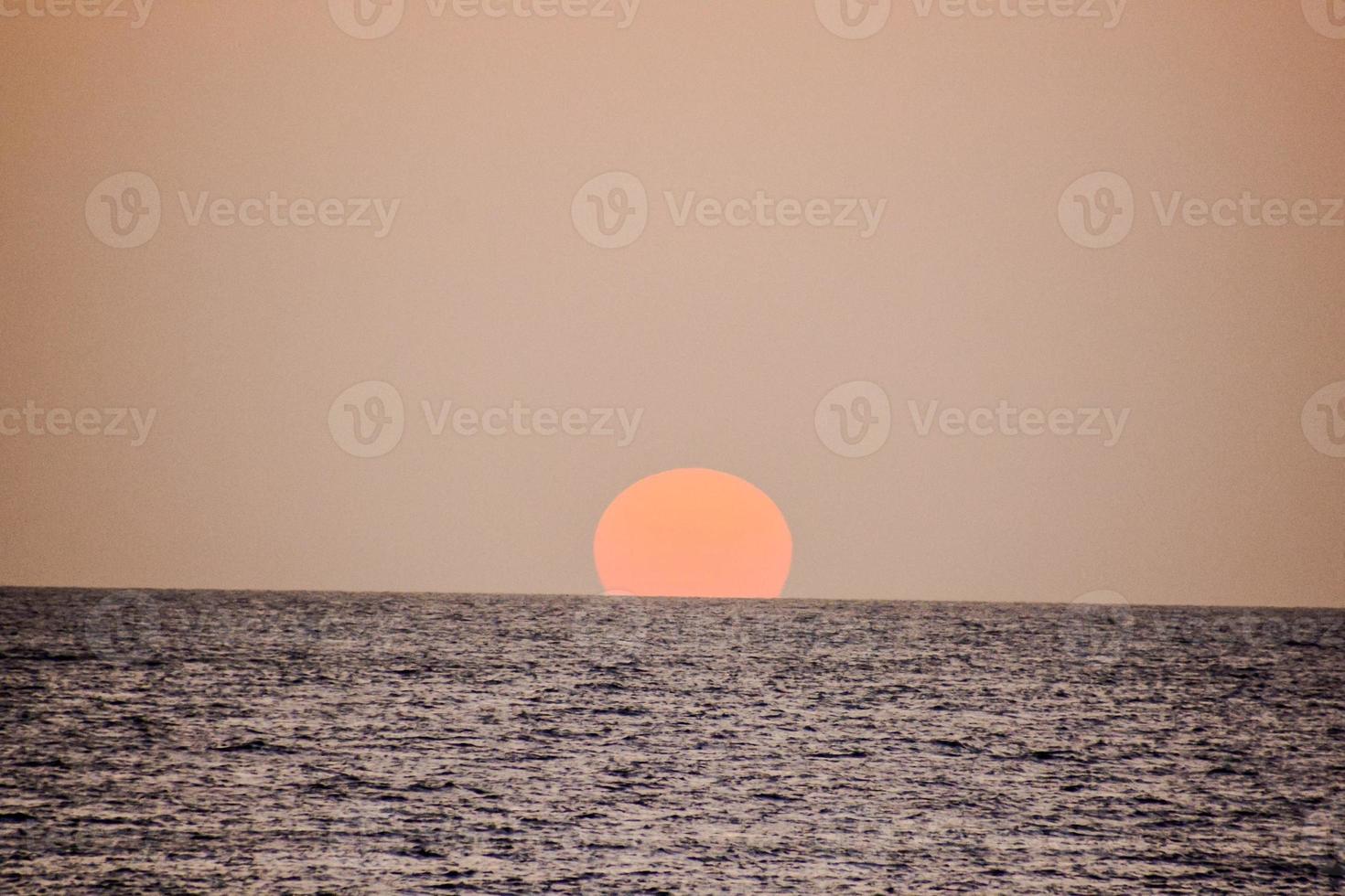 Sunset over the sea photo