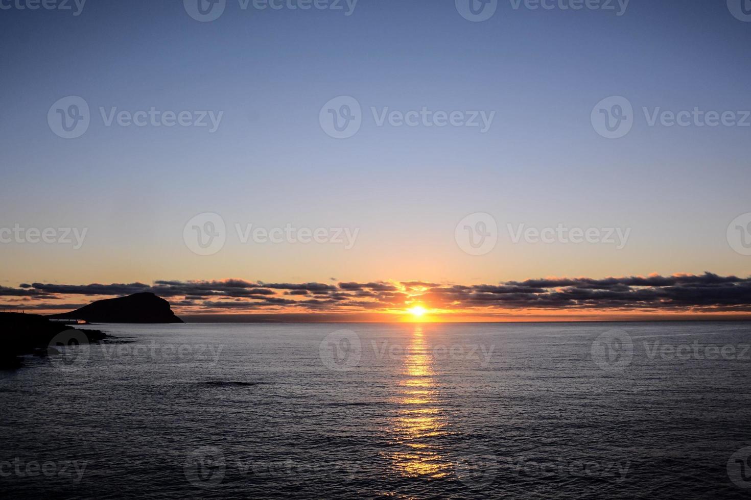 Sunset over the sea photo