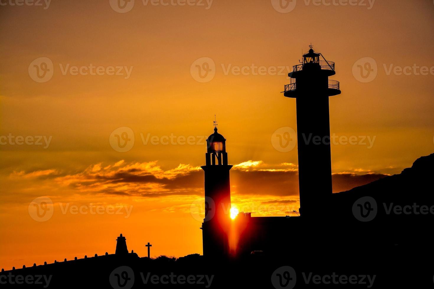 Lighthouses at sunset photo