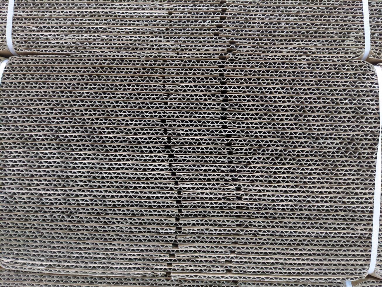 Texture and surface of brown box paper. The photo is suitable to use for warehouse background, warehouse content media.