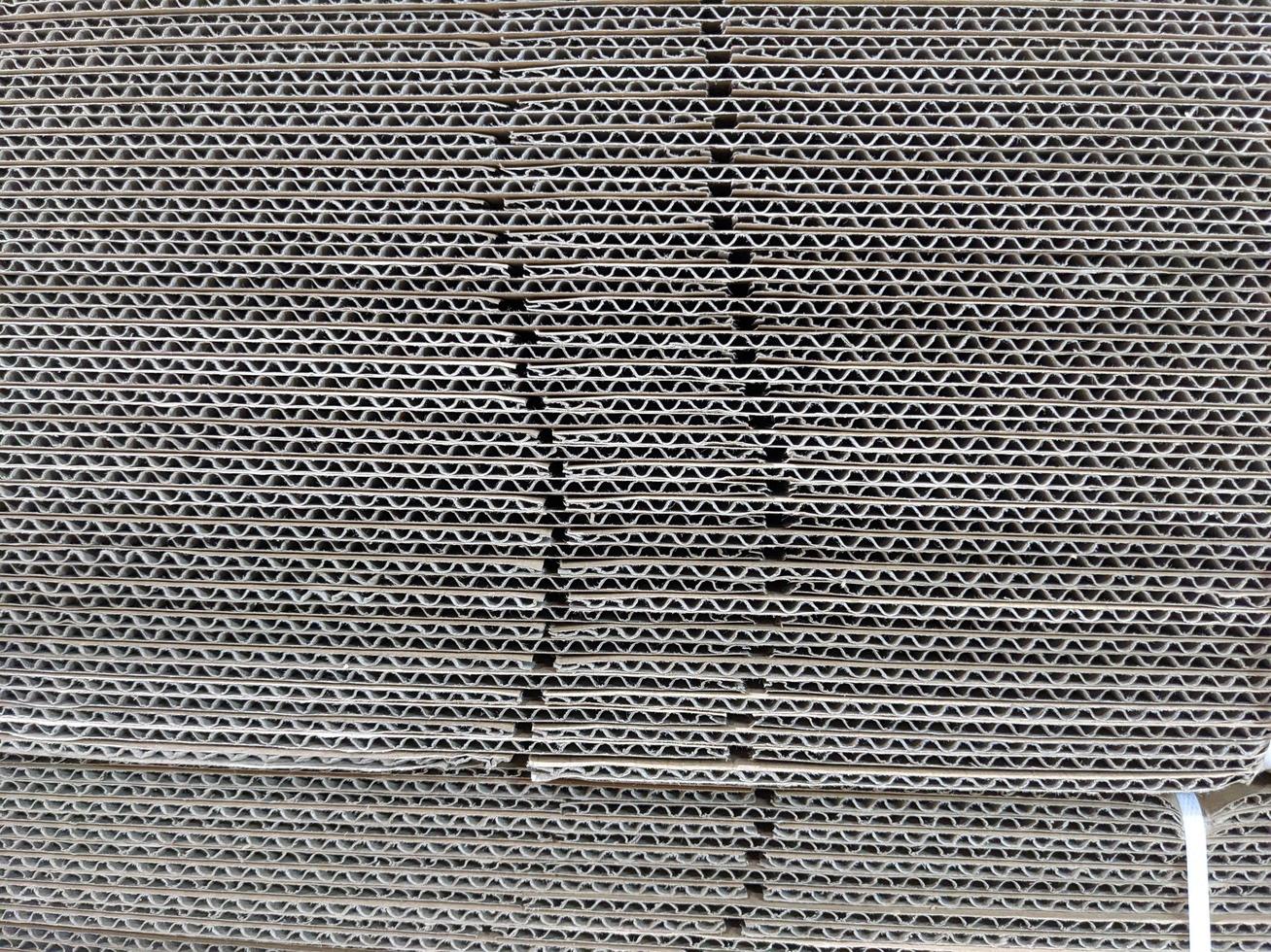 Texture and surface of brown box paper. The photo is suitable to use for warehouse background, warehouse content media.