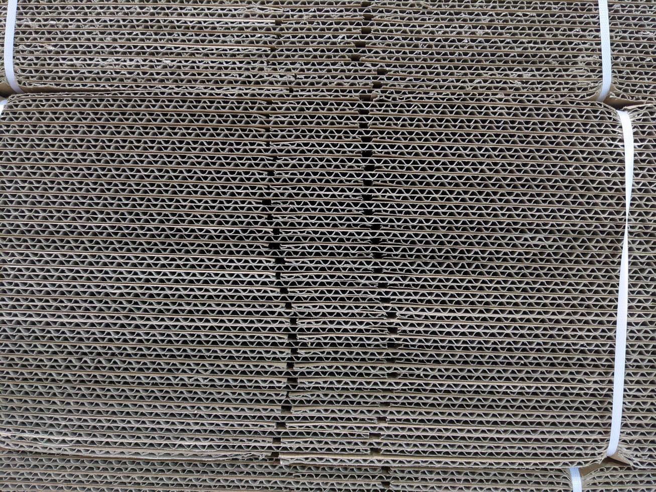 Texture and surface of brown box paper. The photo is suitable to use for warehouse background, warehouse content media.