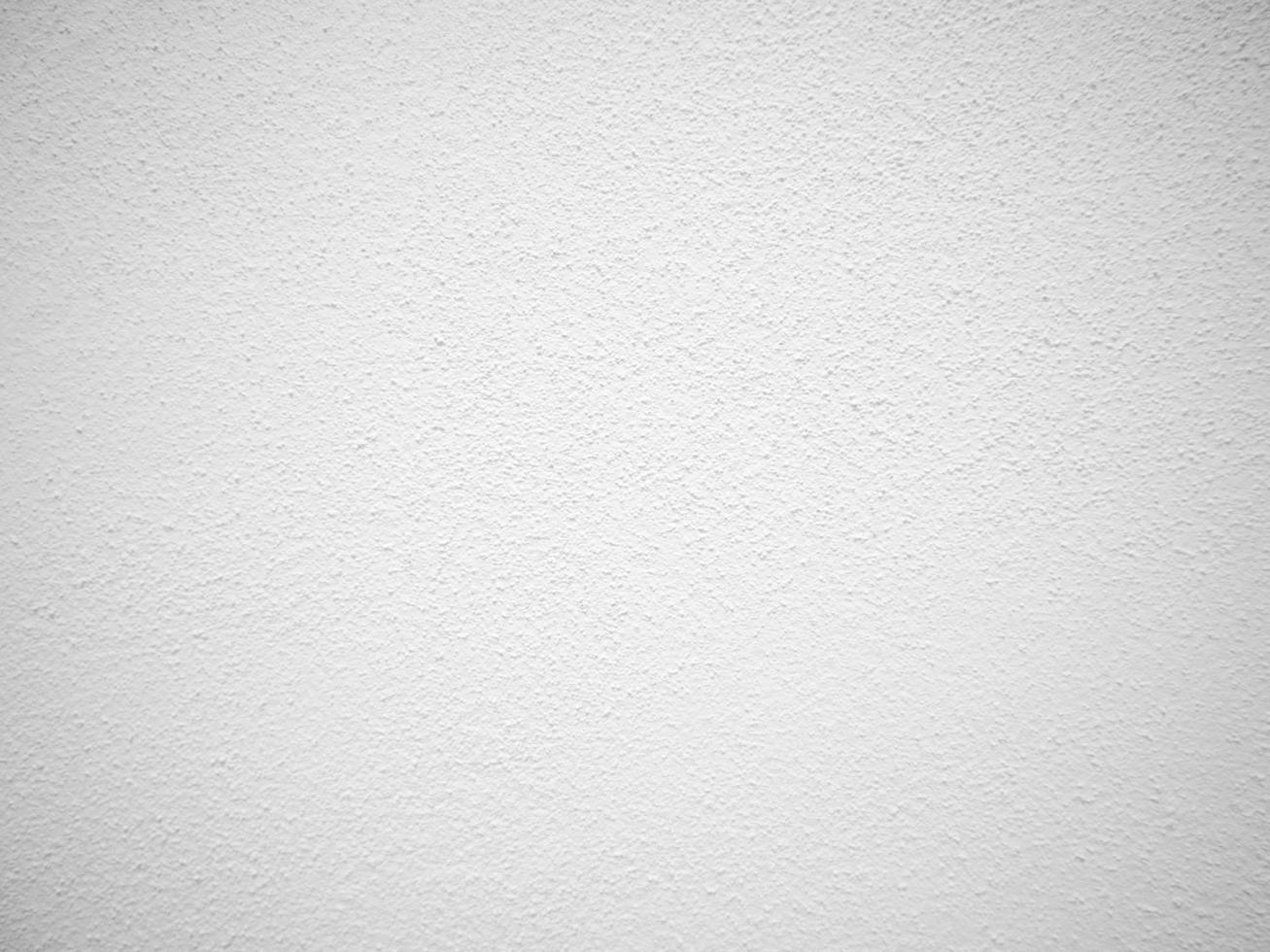 Seamless texture of white cement wall a rough surface, with space for text, for a background. photo