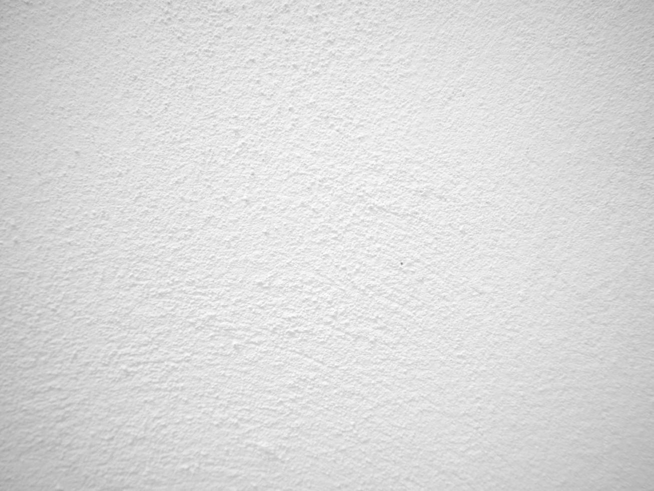 Seamless texture of white cement wall a rough surface, with space for text, for a background. photo