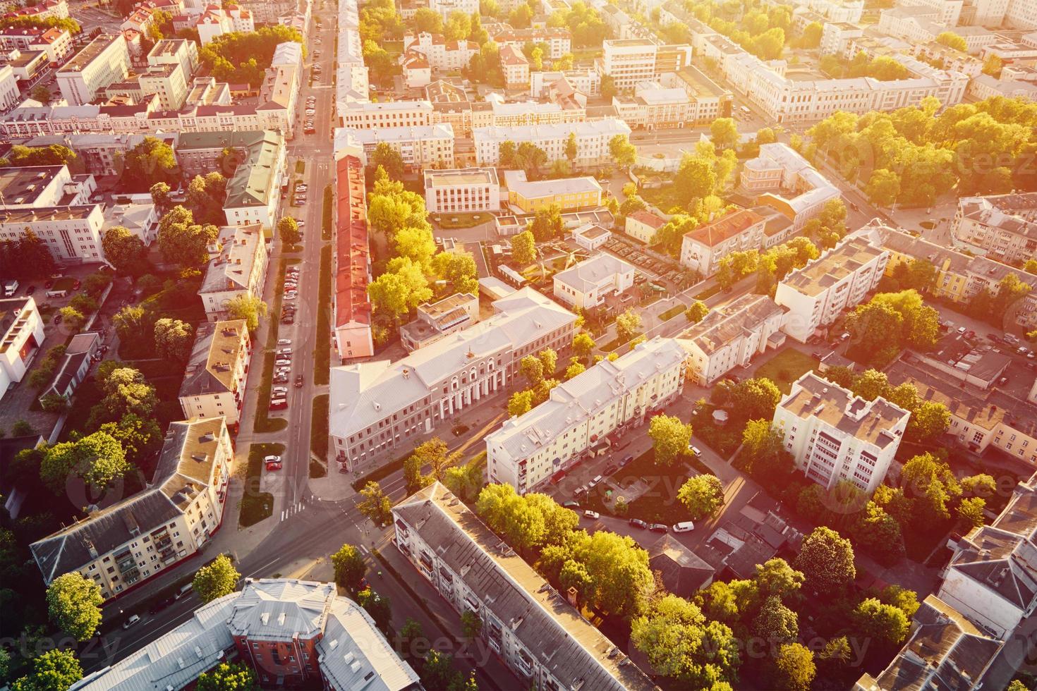 Aerial view of city residential district at sunset photo