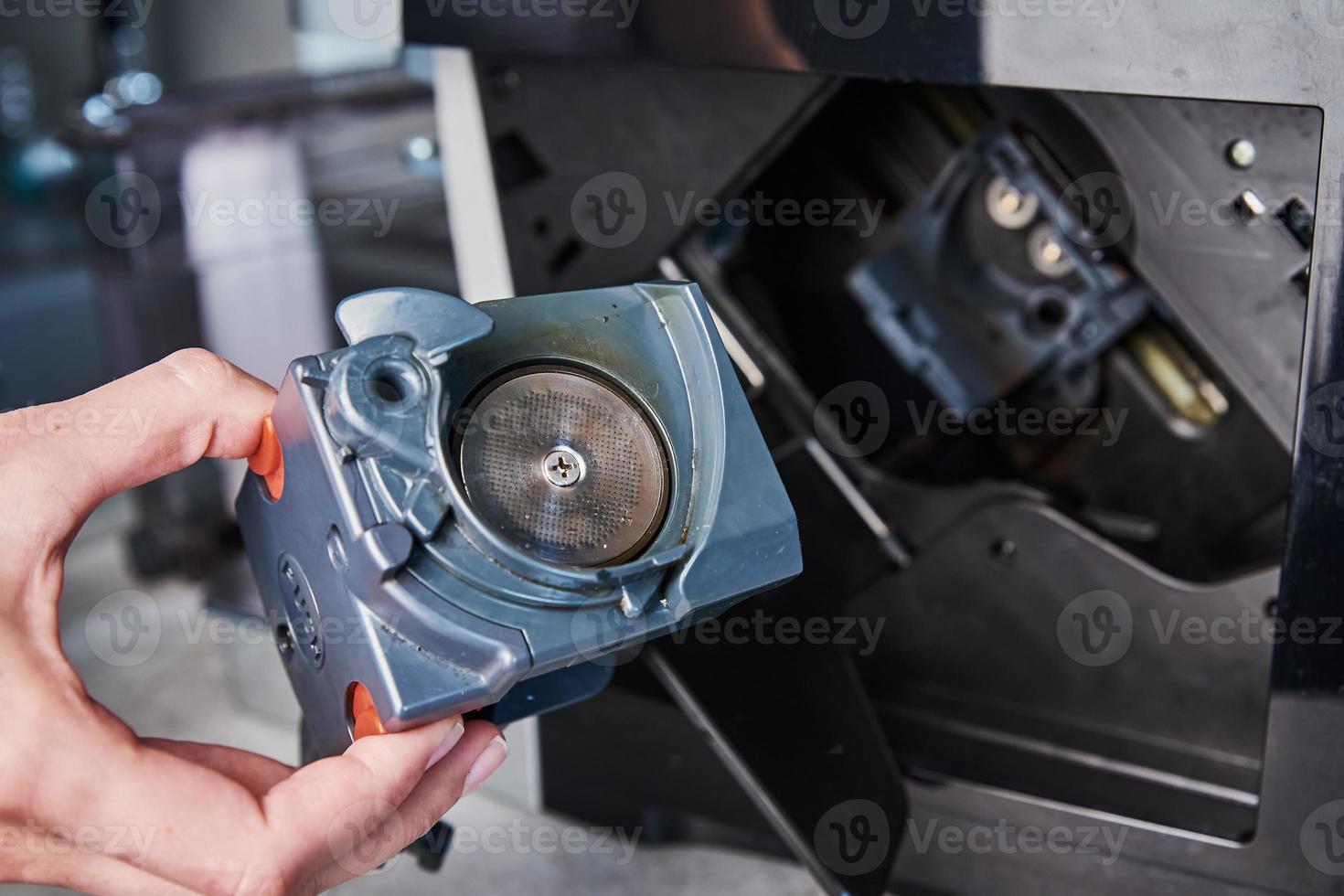 Automatic coffee machine maintenance photo