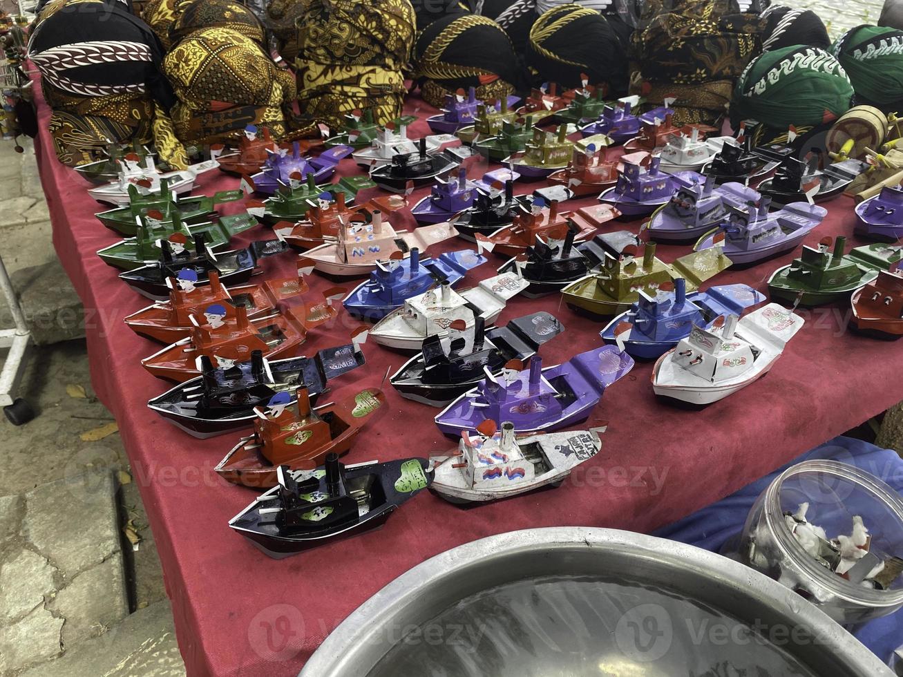 A portrait of an Indonesian traditional toy boat made of cans photo