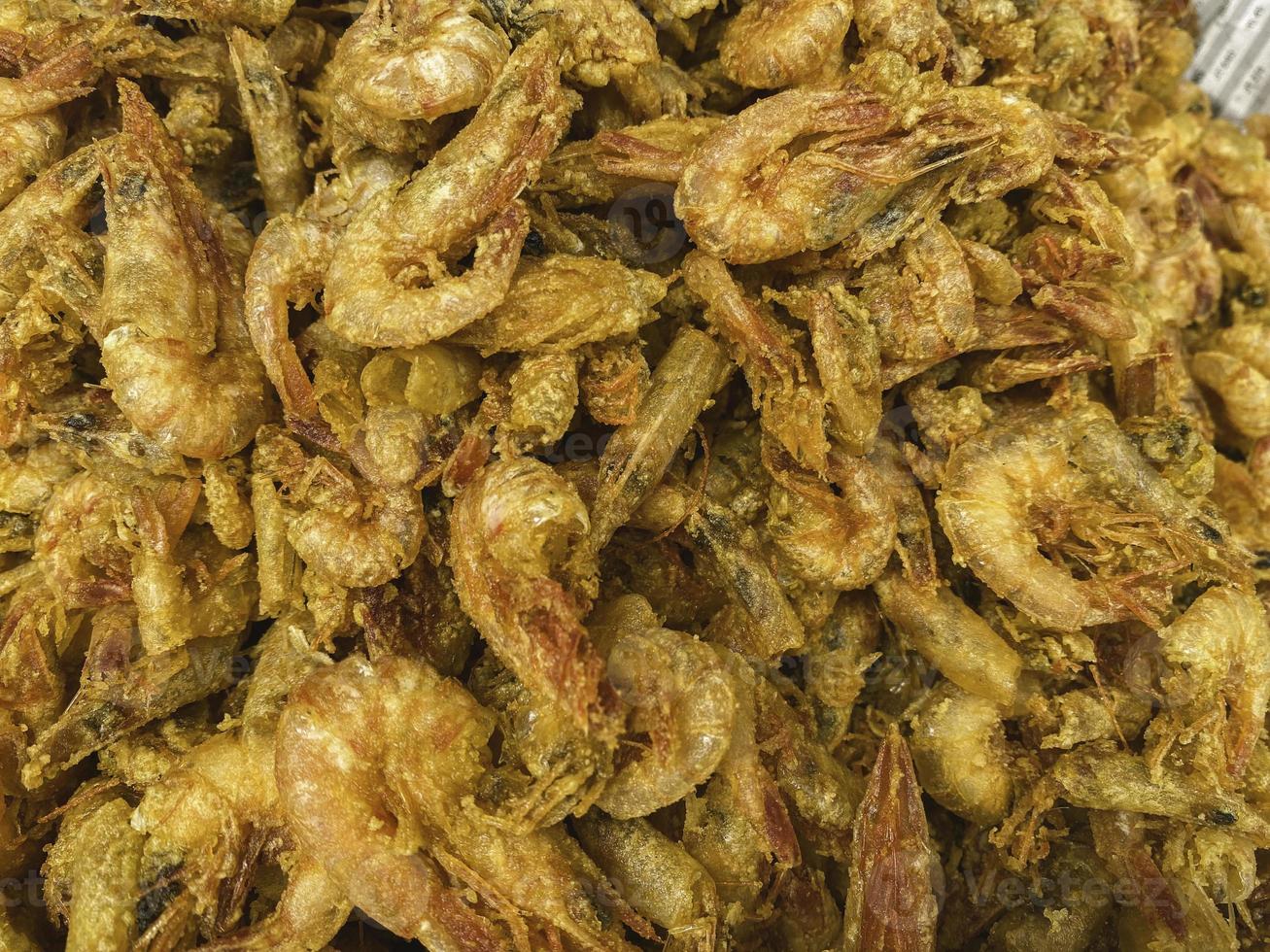 Fried meat fish at traditional market photo