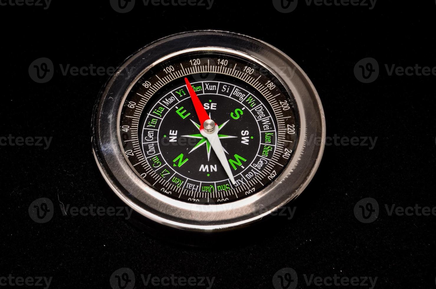 Compass on dark background photo