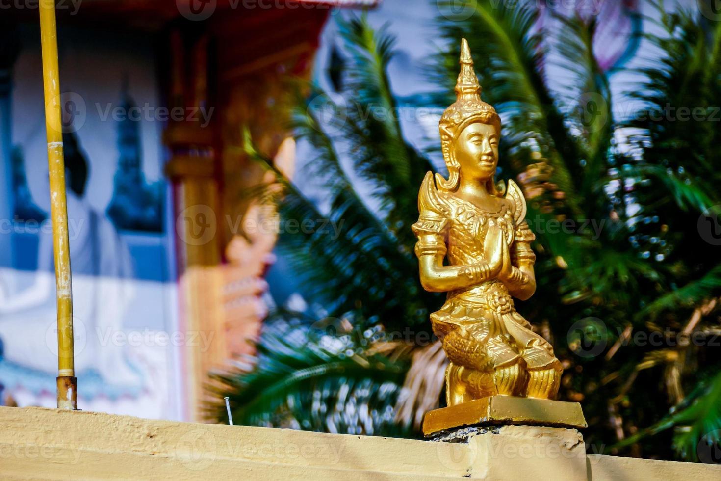 Golden statue in Thailand photo