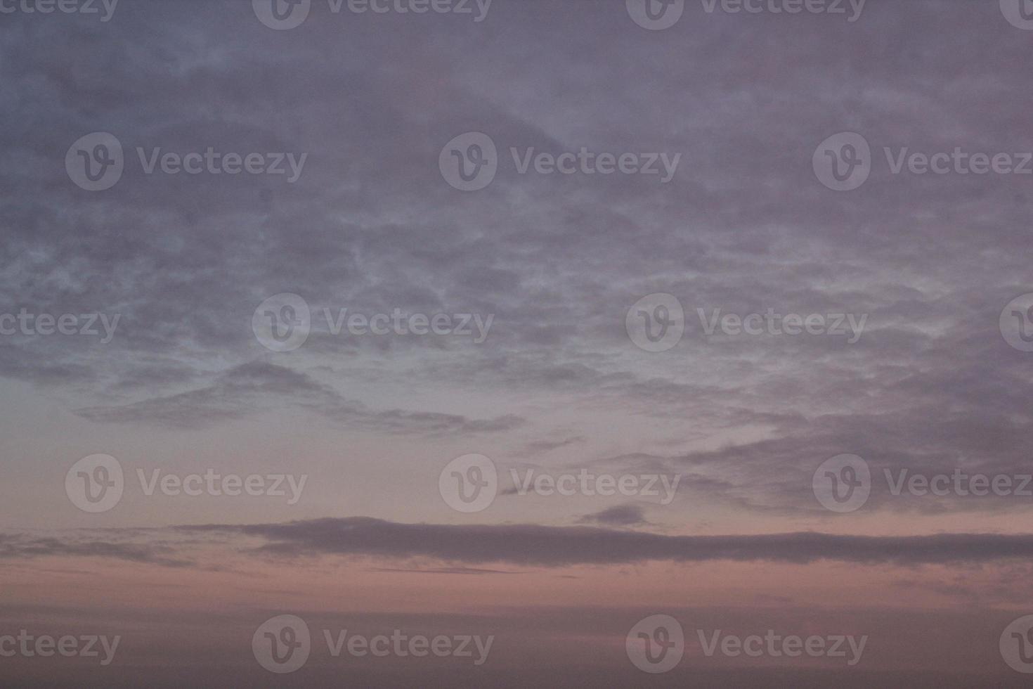 Colourful cloudy twilight beautiful sky cityscape sunset and morning sunrise. Dramatic evening night early morning view. Panoramic nature background concept. Copy space for text. World environment day photo