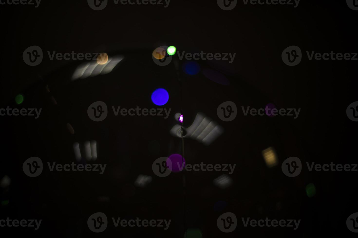 Reflection in dark. Ball will reflect lights. Transparent surface on dark background. Rubber material. photo