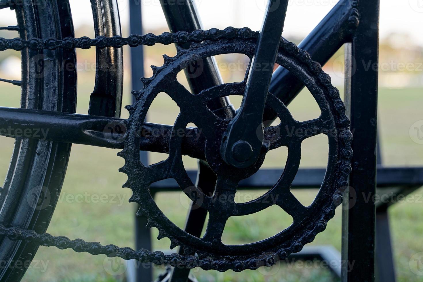 bicycle sprocket is a part in the transmission system. Shaped like a gear, circular, flat, with a hole in the middle, the edge is serrated. so that the chain can go down to the groove of the sprocket. photo