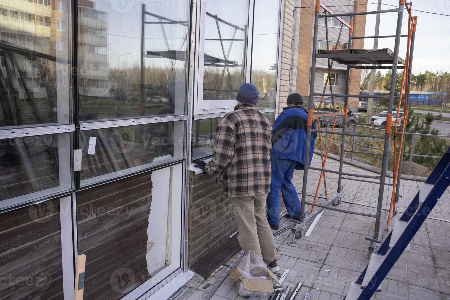 Replacement of double-glazed windows in shop windows, reconstruction of the supermarket facade, repair of windows photo
