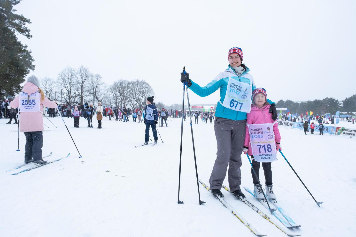 Annual All-Russian sports event action Ski Track of Russia. Sporty lifestyle for adults, children, family holiday on cross-country skiing - mass race on a snowy track. Russia, Kaluga - March 4, 2023 photo