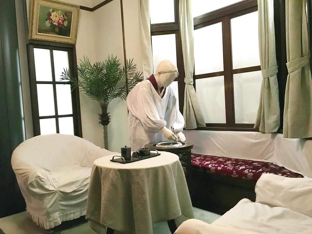OSAKA, JAPAN, 2017 - Japanese female statue working as housekeeper for foreigner in Osaka, Show in The Osaka Museum of History. photo