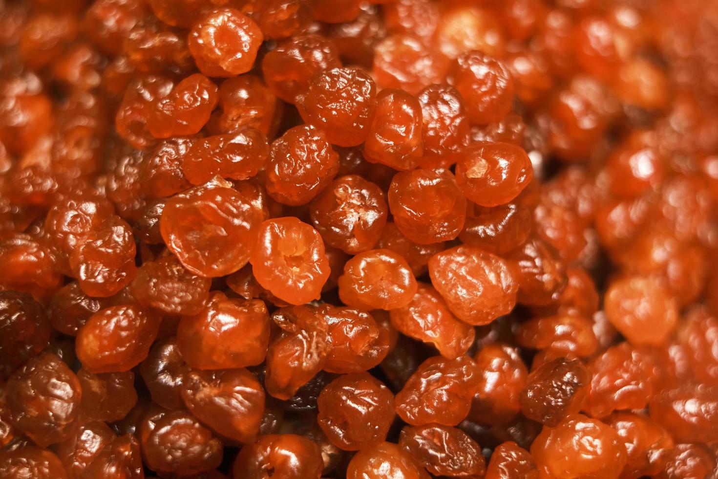 A bunch of sweet red raisins photo