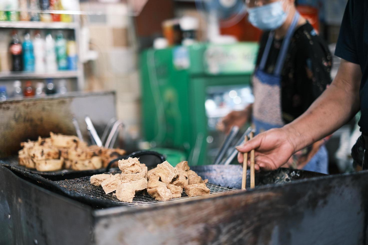 The chef making fried stinky tofu photo