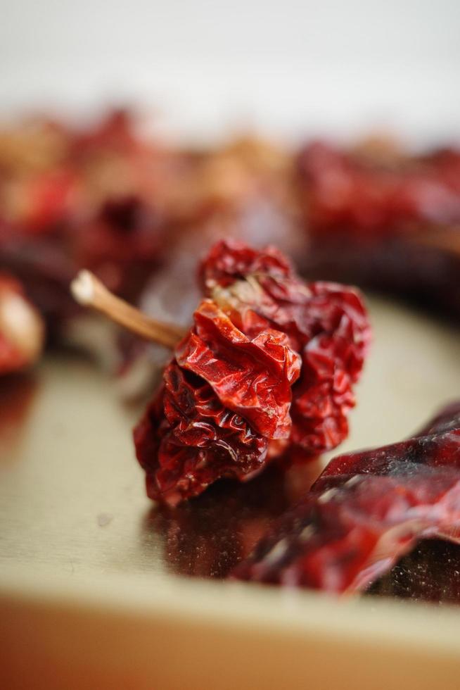 Dried chili macro on tabletop photo