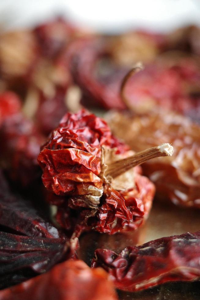 Dried chili macro on tabletop photo