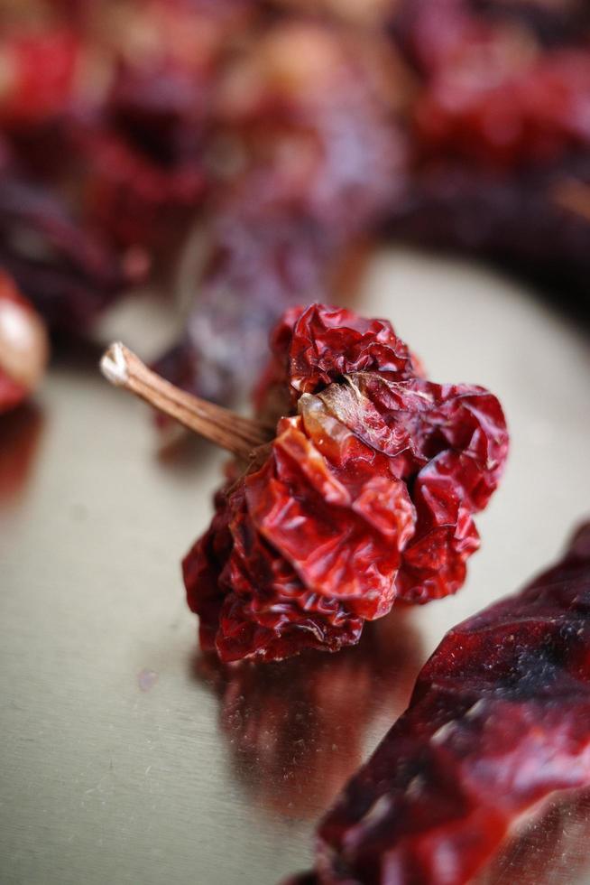 Dried chili macro on tabletop photo