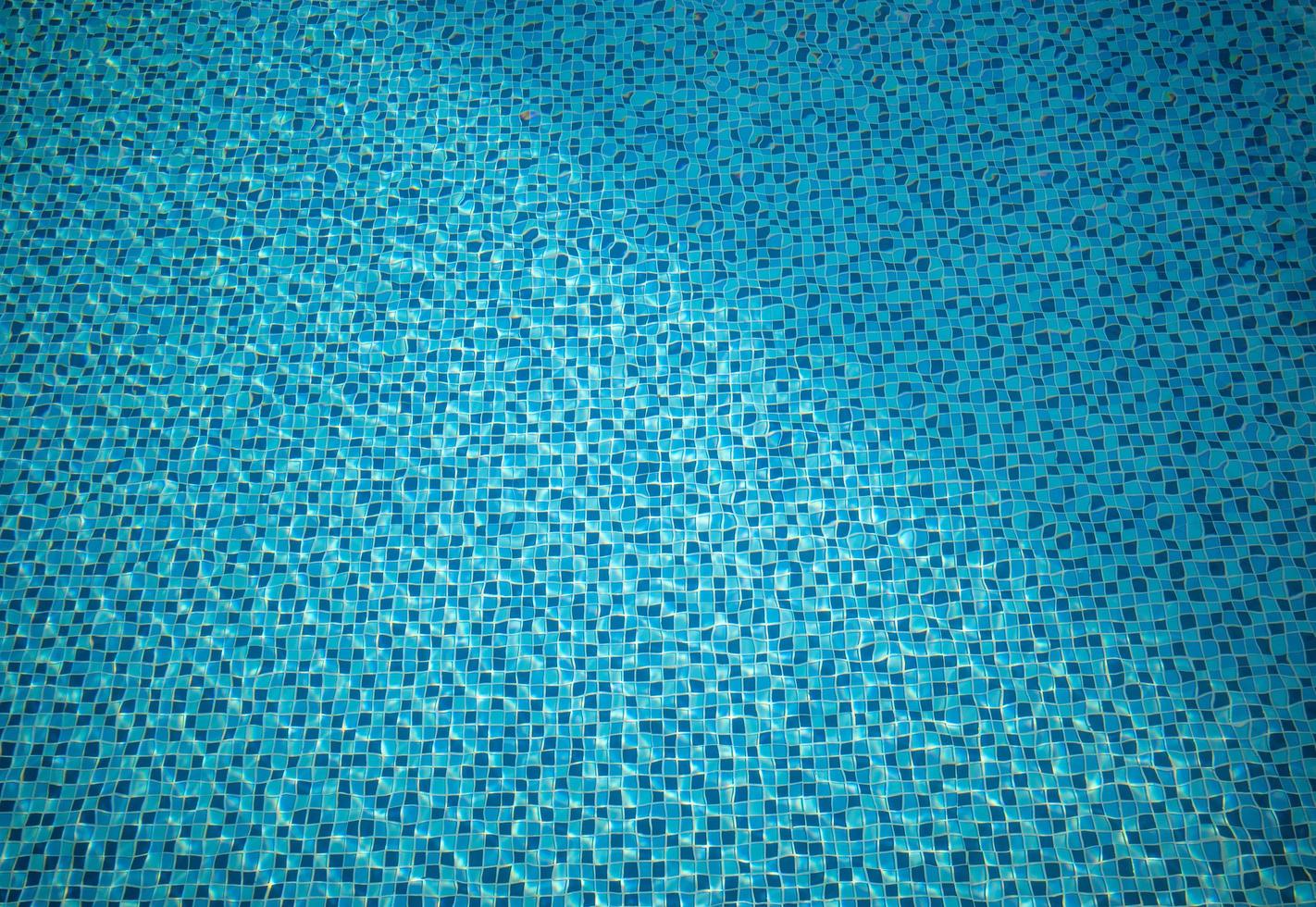 Blue mosaic tiled swimming pool photo