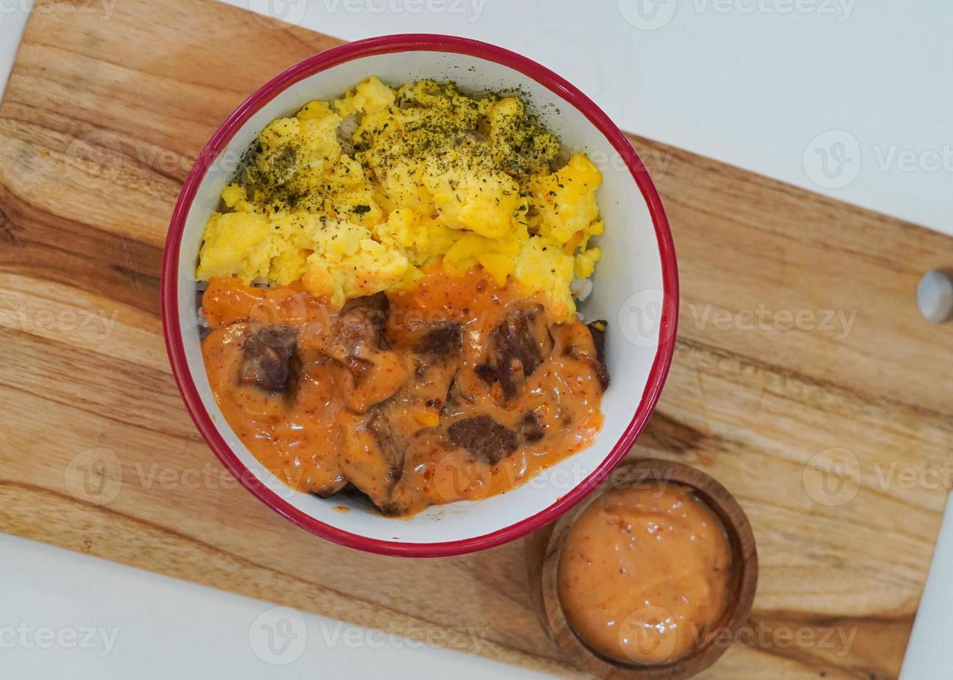 Top View Japanese Rice Bowl Beef with topping scrambler egg photo