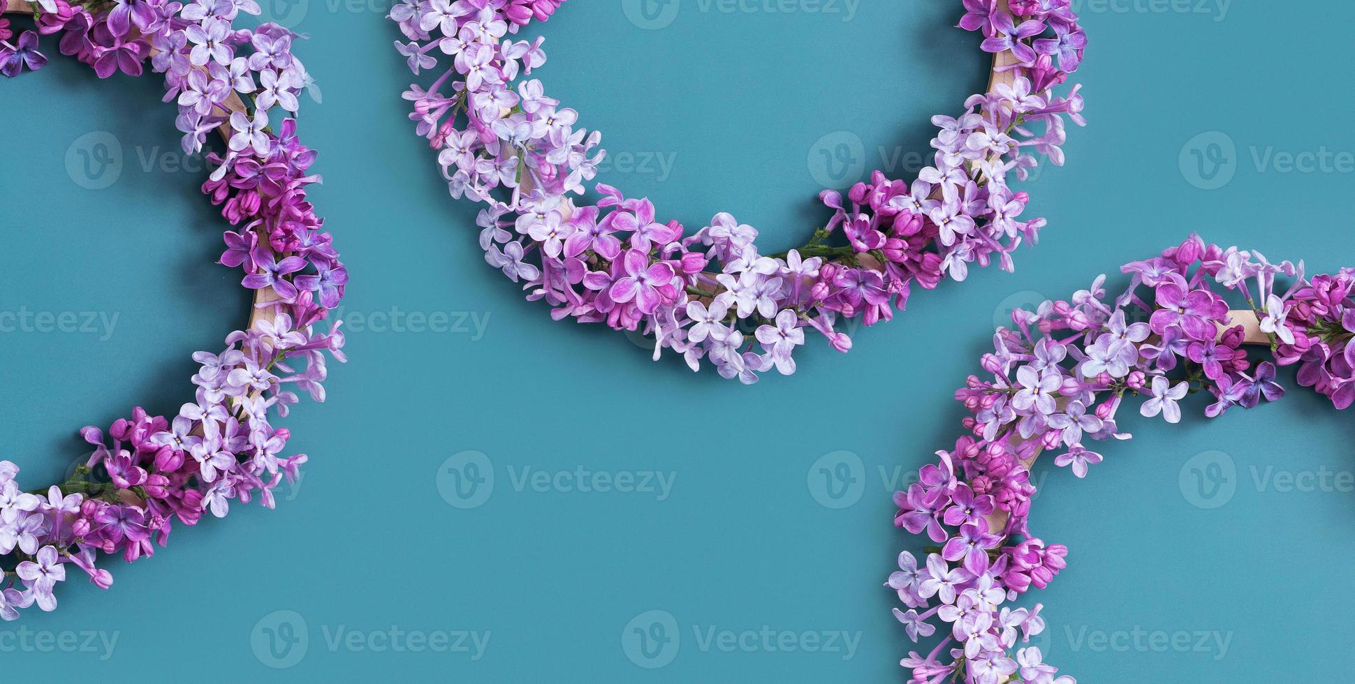 Banner with Lilac flowers wreath with copy space. Summer, spring floral composition flat lay, top view photo