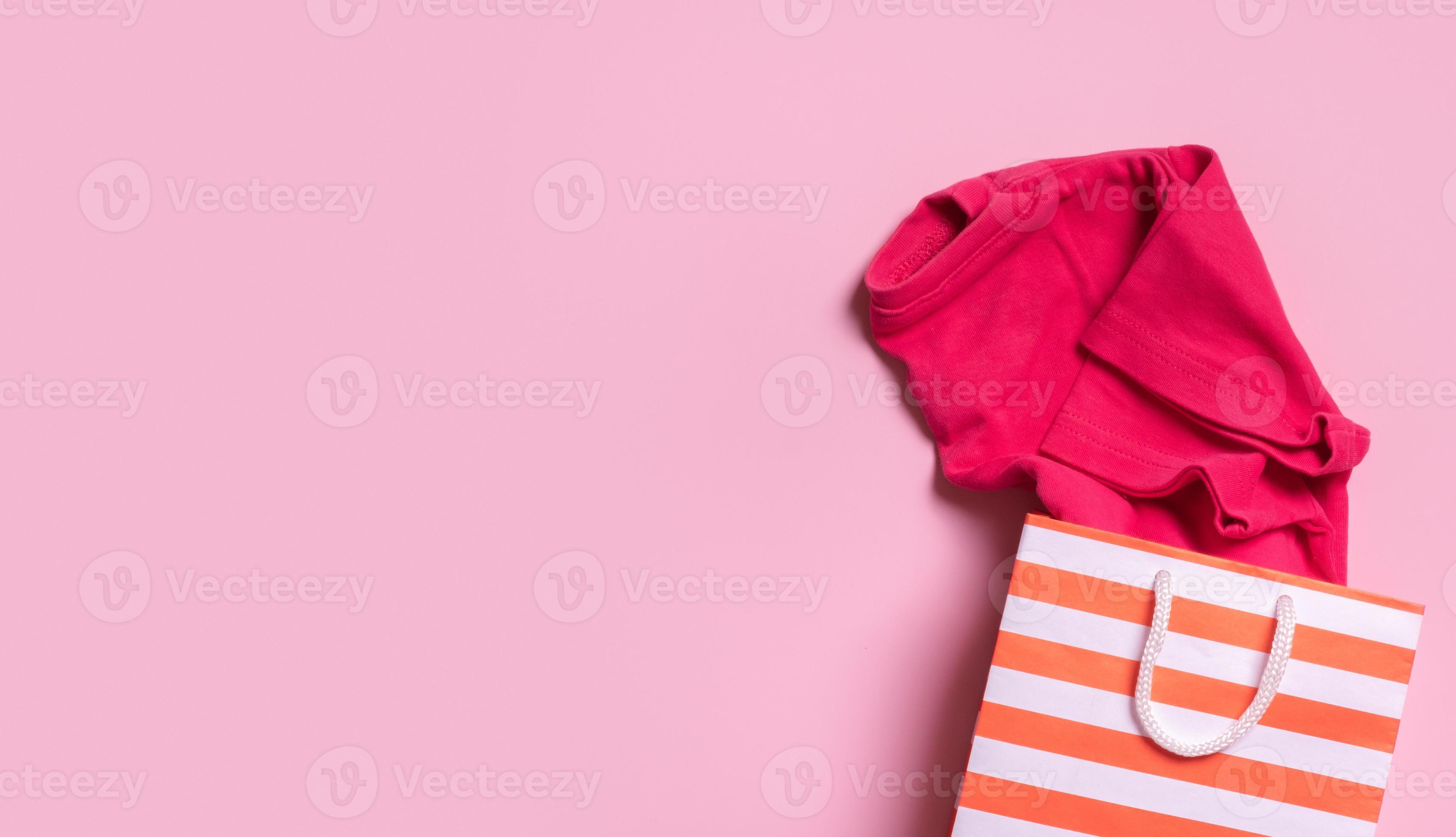 Children's clothes in shopping bag. Second hand, clothing recycling