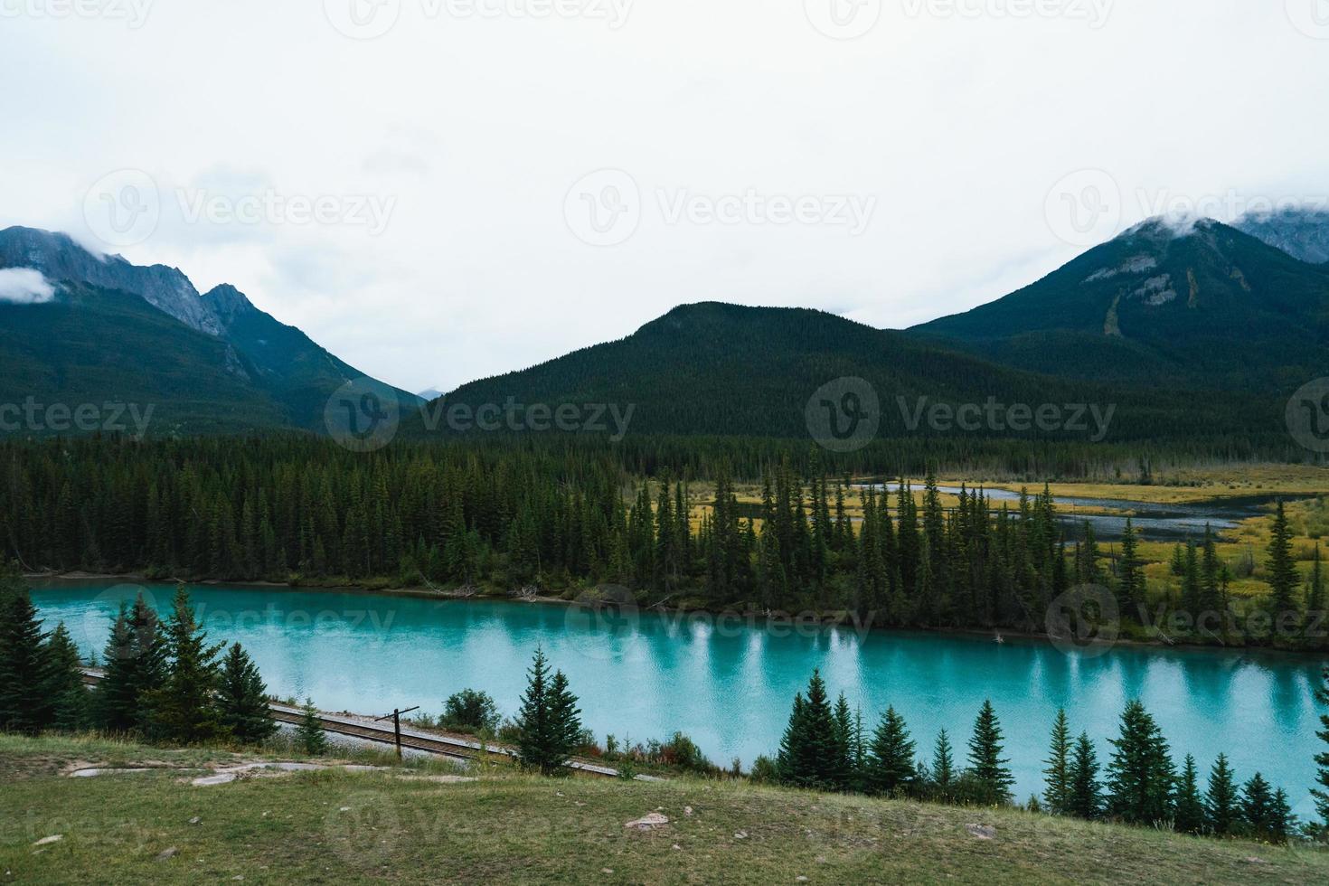 Bow River and Rocky Mountains from Backswamp Viewpoint in Banff National Park photo