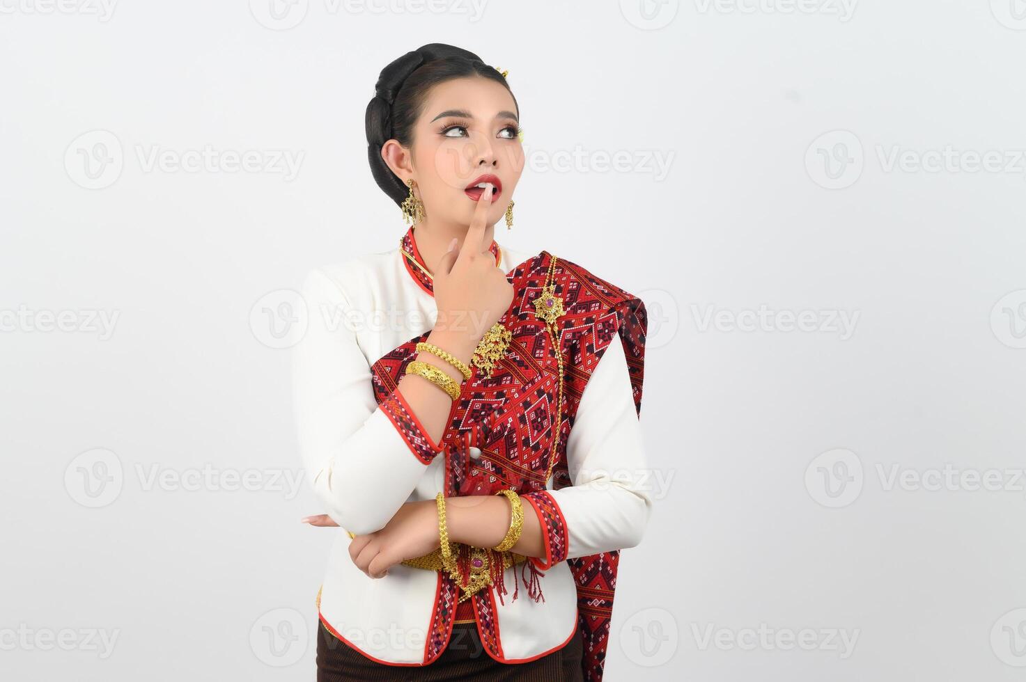 Young beautiful woman Thai Lanna dress on with shouting posture photo