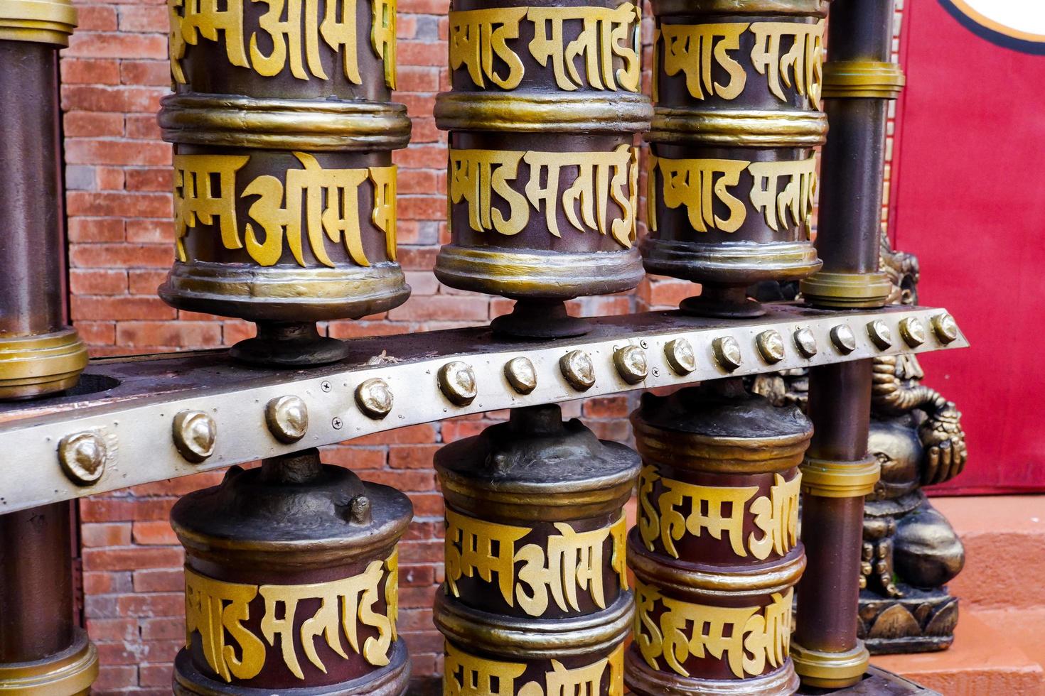 Batu-Indonesia, January 2, 2023. Selective focus of prayer wheel in front of the temple. photo