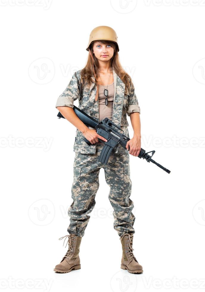 soldado joven bello niña vestido en un camuflaje con un pistola en su mano en blanco foto