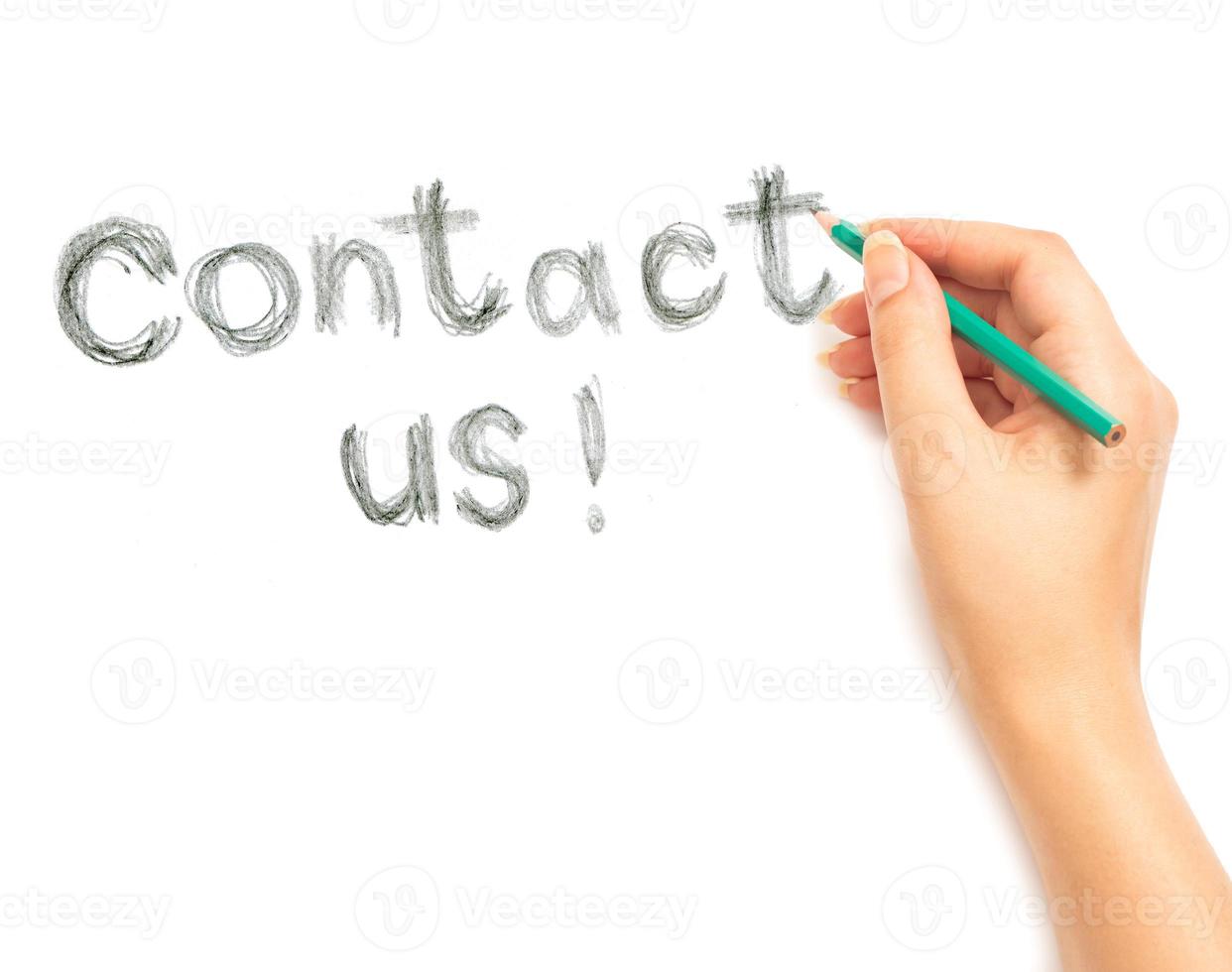 Woman's hand writing contact us on white photo