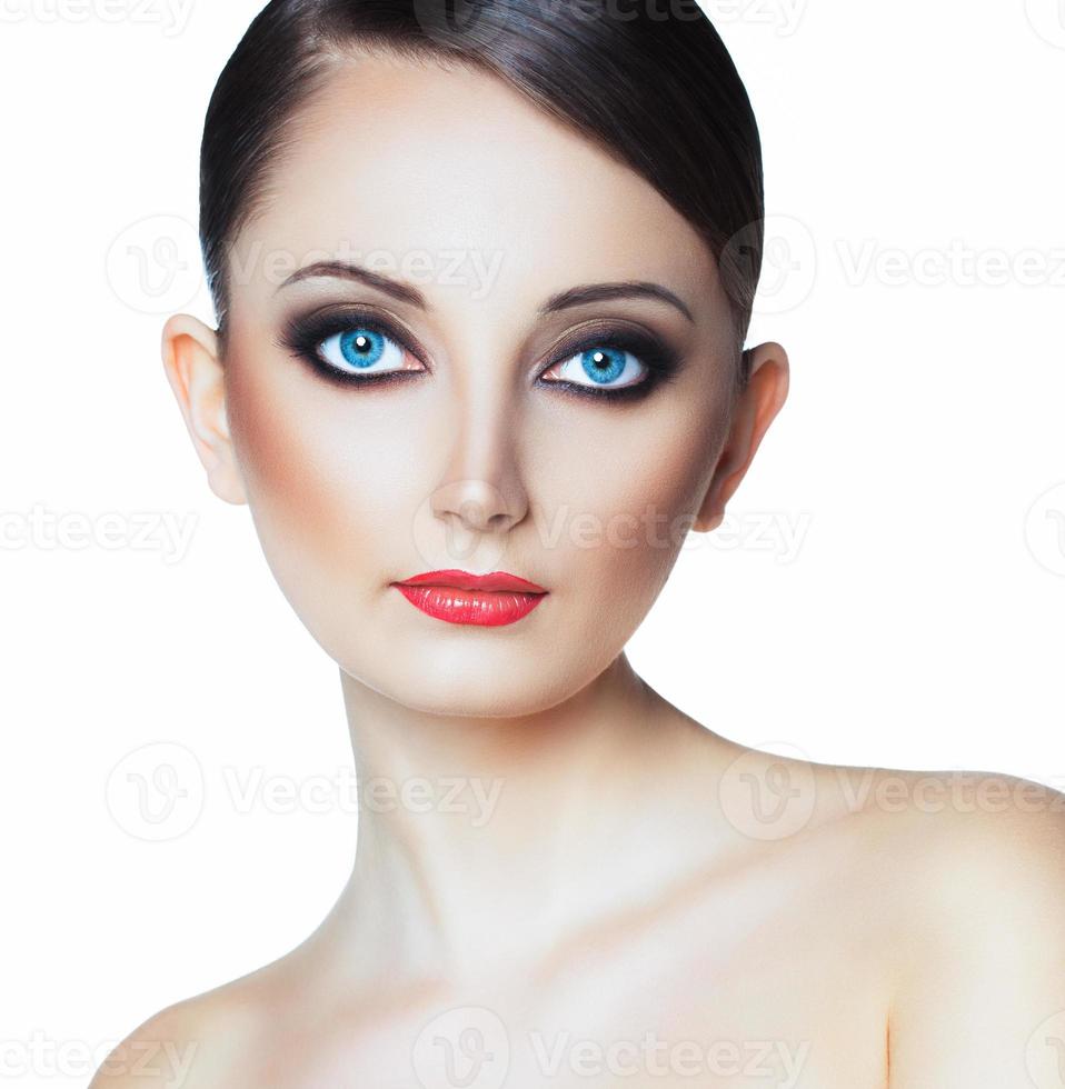 Portrait of a beautiful woman with a glamorous retro makeup photo