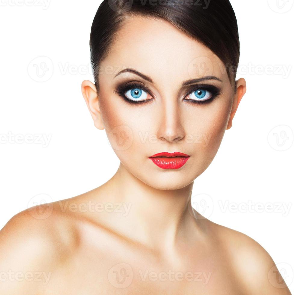 Portrait of a beautiful woman with a glamorous retro makeup photo