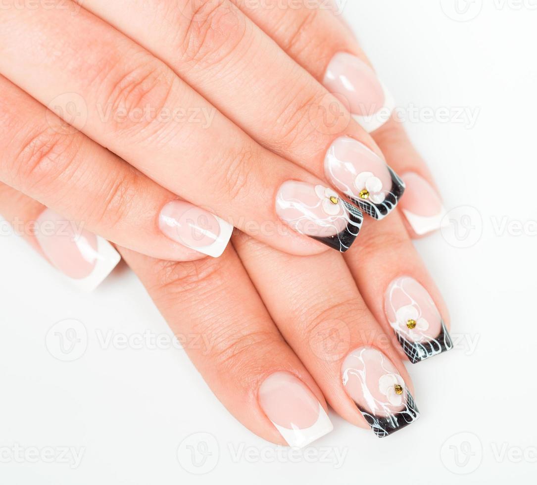 Beautiful hands with manicure on a light background photo