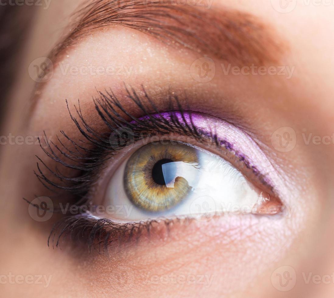 Closeup of beautiful eye with glamorous makeup photo