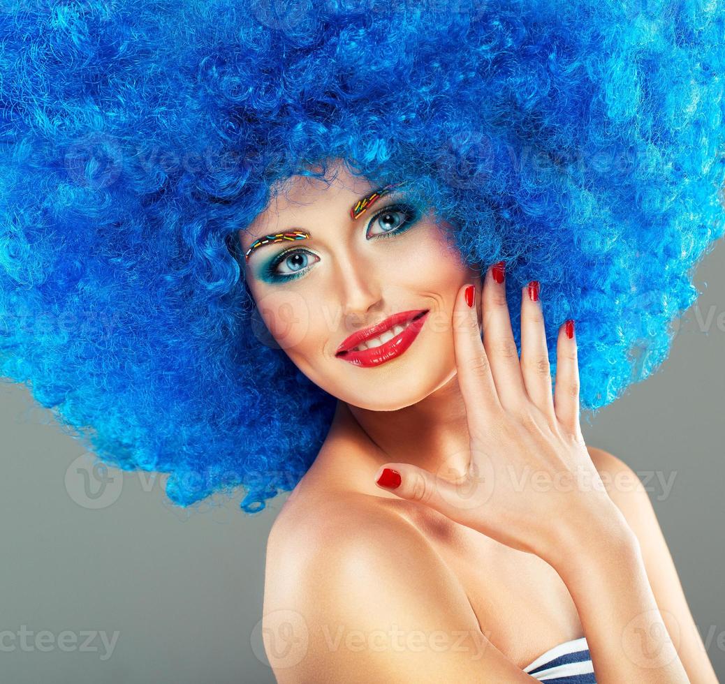 Portrait of a young beautiful girl with bright makeup photo