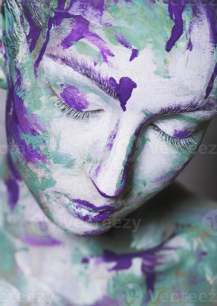 Portrait of young girl with creative make-up photo