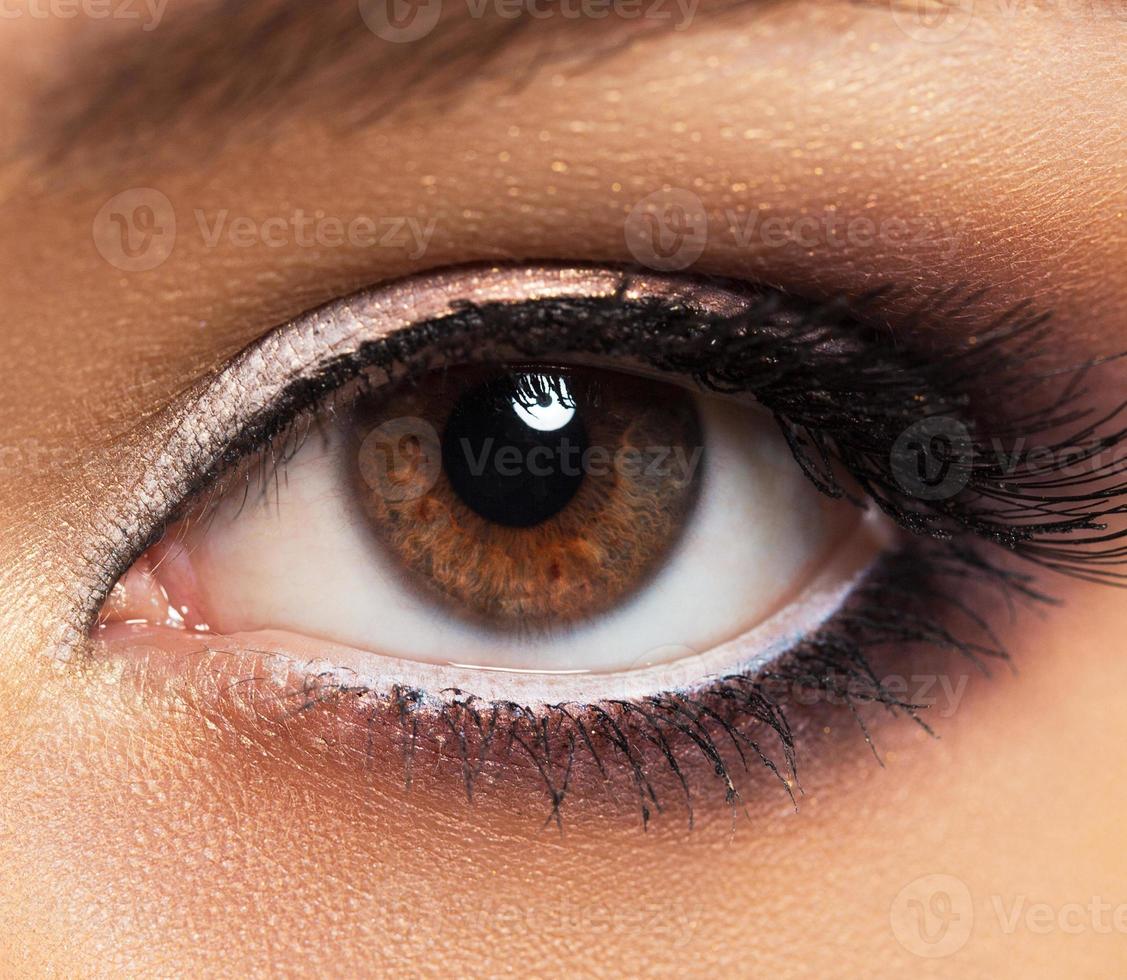 Closeup of womanish eye with glamorous makeup photo