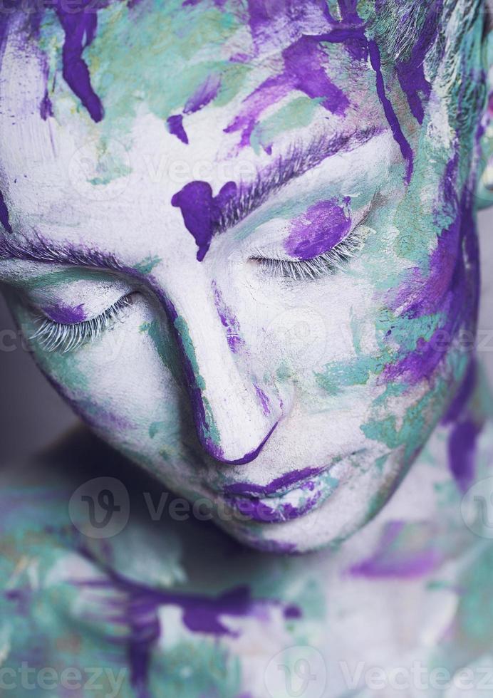 Portrait of young girl with creative make-up photo