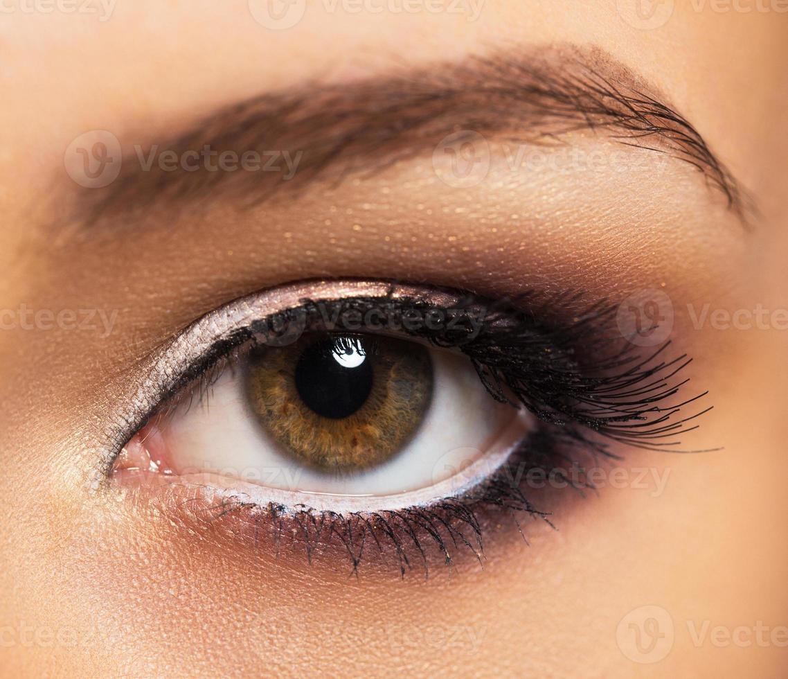 Closeup of beautiful eye with glamorous makeup photo