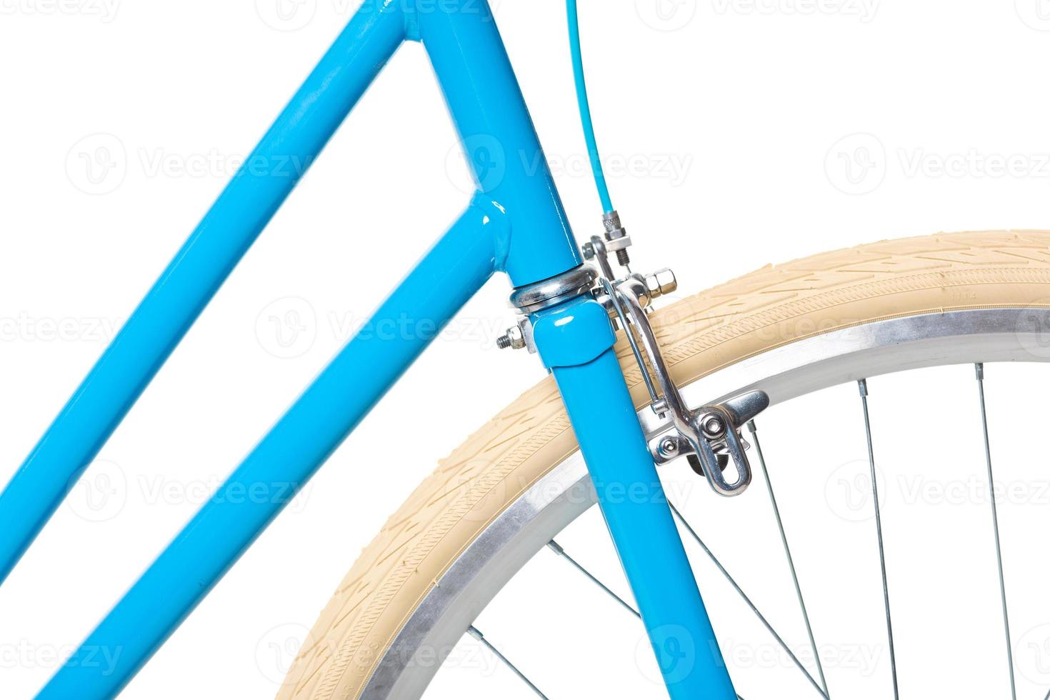 Stylish womens blue bicycle isolated on white photo