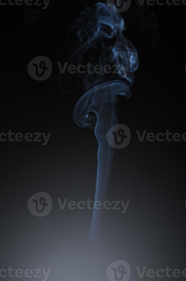 Abstract smoke on black photo