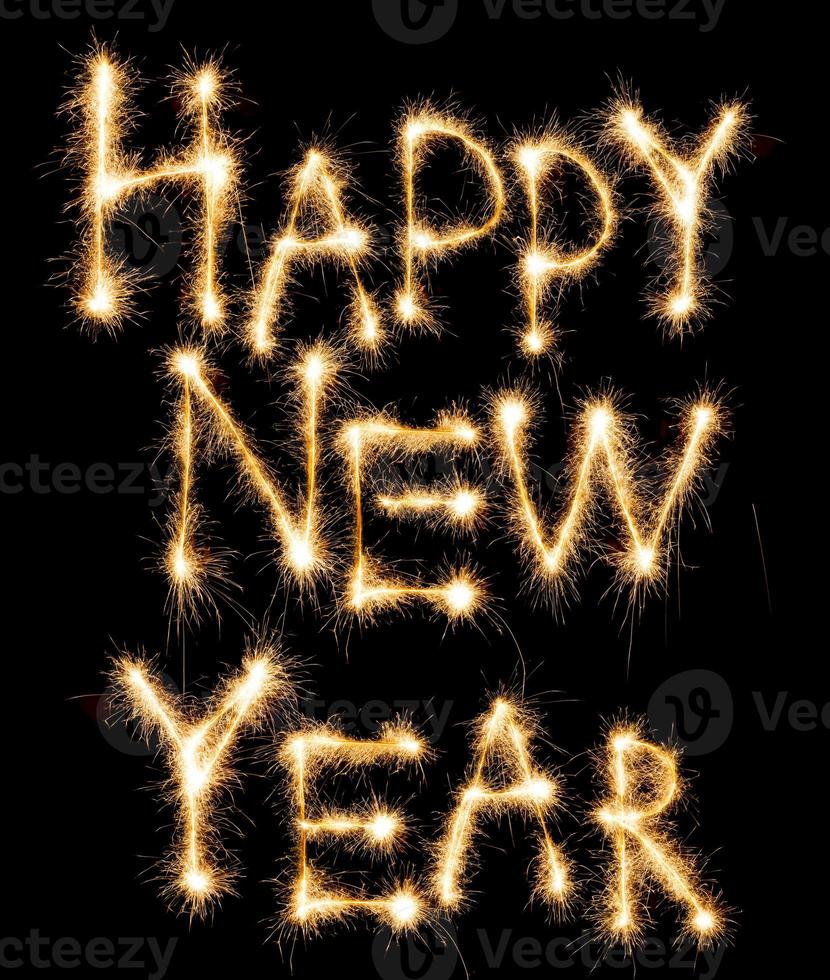 Happy New Year made of sparkles on black photo