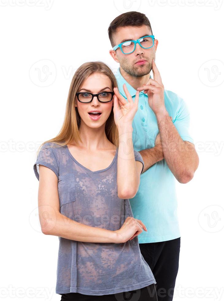 Beautiful young happy couple smiling, man and woman looking at camera, isolated over white photo