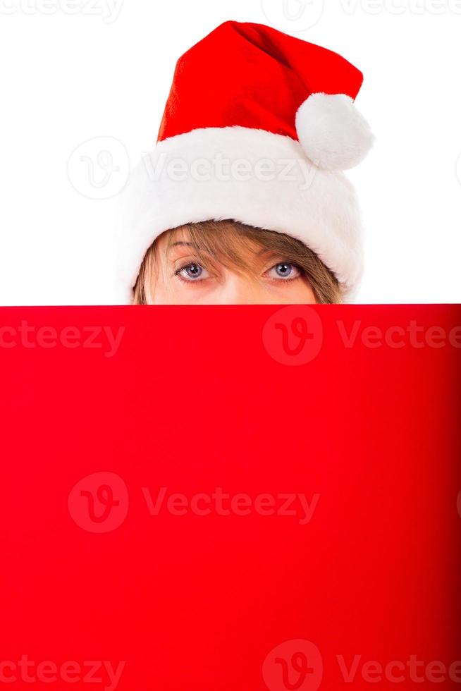 Christmas girl with red placard on white photo